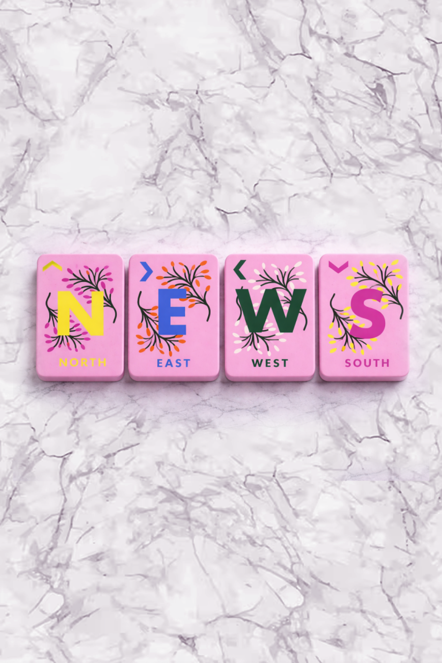 Floating Mahjong Tiles in Floral Pink for the Pool