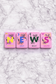 Floating Mahjong Tiles in Floral Pink for the Pool